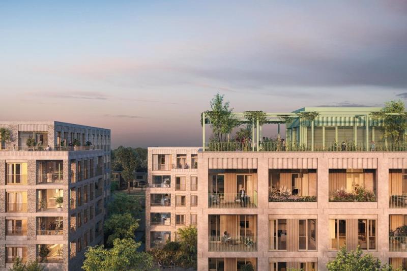 zicht op woonblok met daktuin